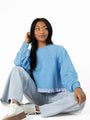 Away We Go Cropped Blue Stripe Ruffle Hem Crew Neck Sweatshirt