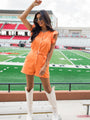 True Traditions Orange Ruffle Sleeve Romper