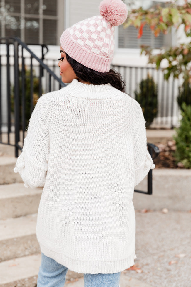 White pom pom on sale sweater