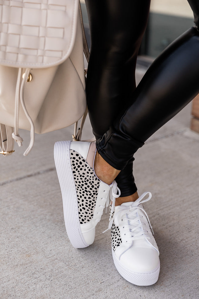 White sneakers with store leopard print